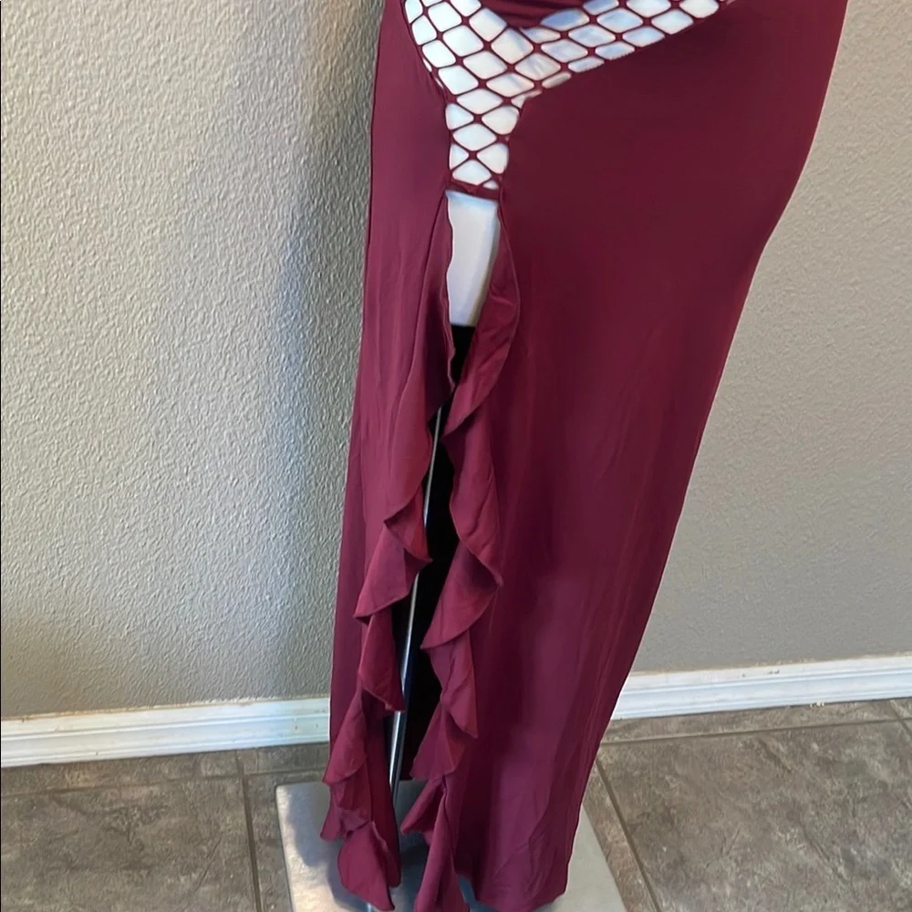 Elegant Asymmetrical Burgundy Dress with Chic Open Areas - Picture 8 of 9